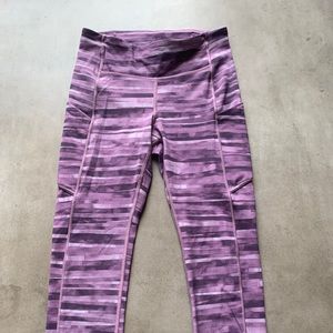 Purple Lululemon Cropped 22” leggings.